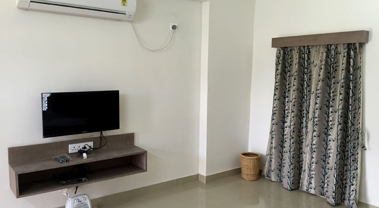 Sundarban Residency room with bed